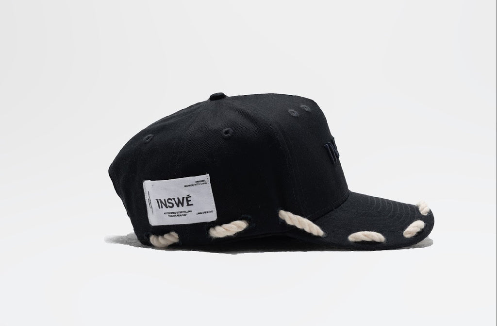 Black rope trucker cap