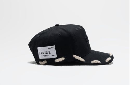 Black rope trucker cap