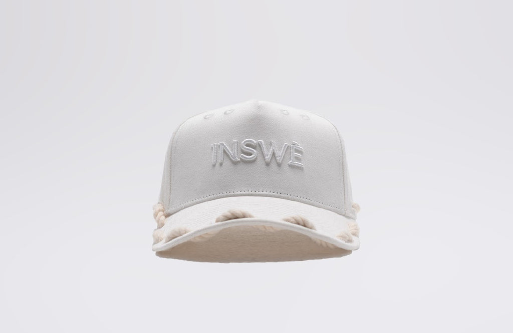 white rope cap