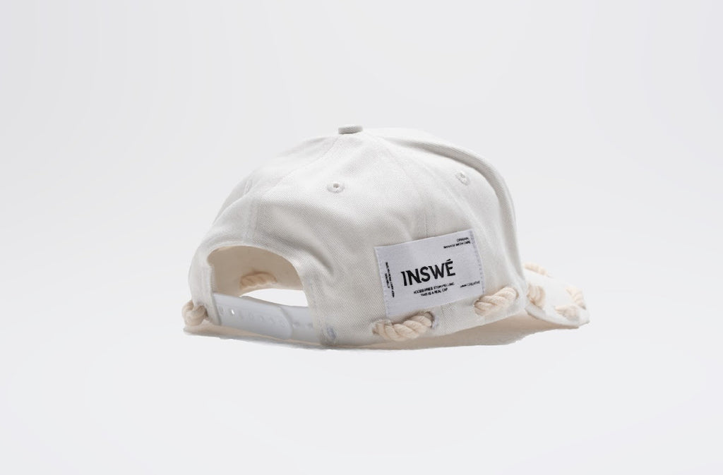 white rope cap