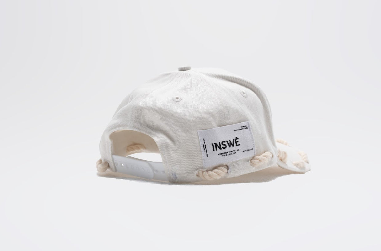 white rope cap