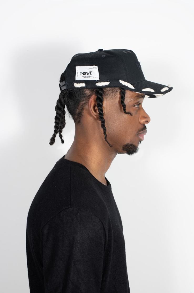Black rope trucker cap