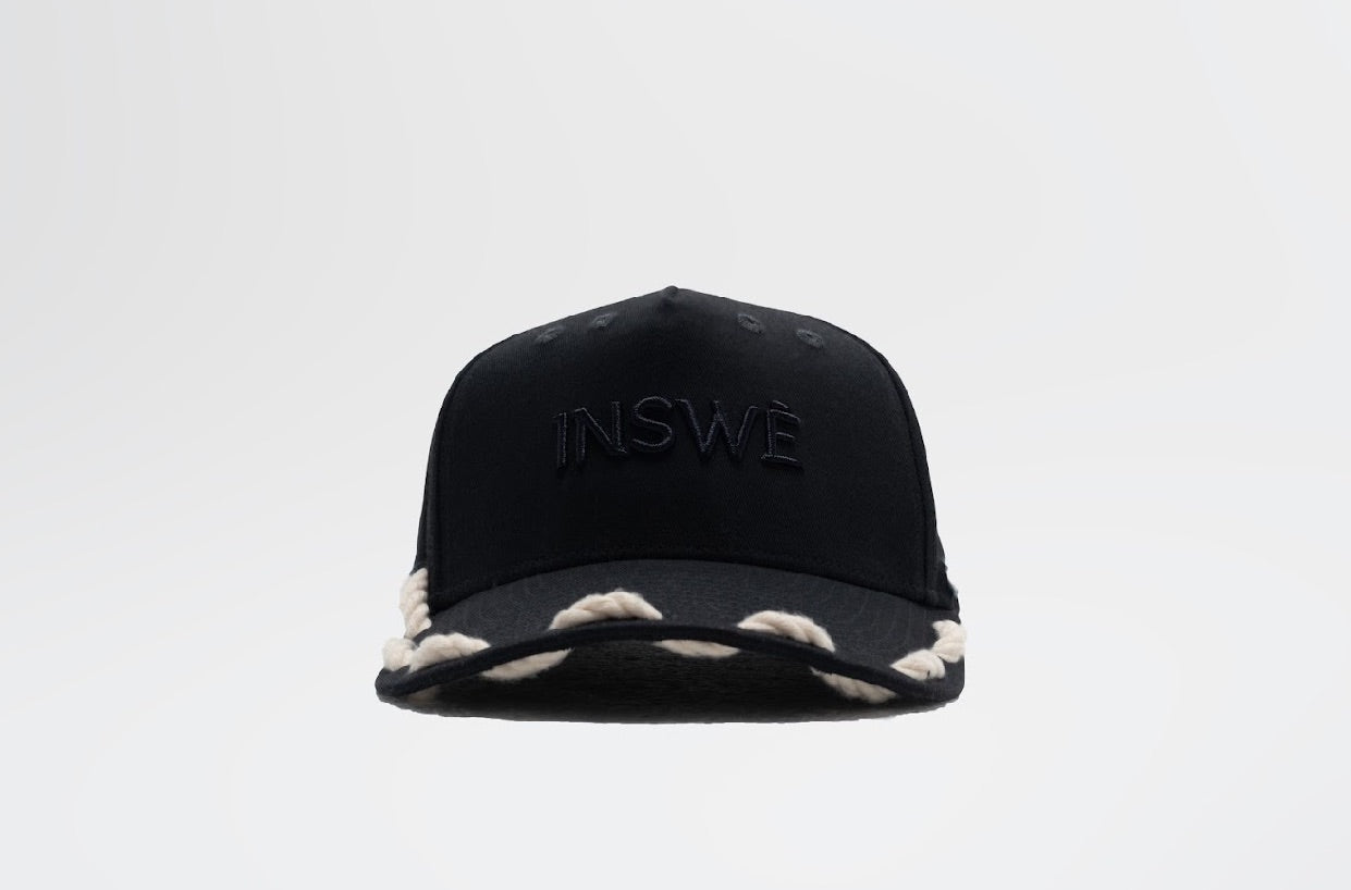 Black rope trucker cap